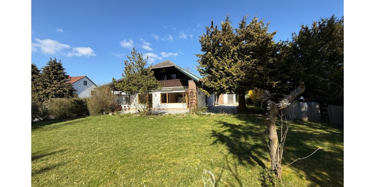 Architektenhaus mit großzügiger Einliegerwohnung und großem Garten in attraktiver Wohnlage - Einfamilienhaus Unterpleichfeld | Angebot:26321812