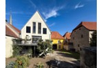 Traumhaftes Ensemble: Energieeffizientes (A) Einfamilienhaus mit Büro, großem Innenhof & Garten - Mehrfamilienhaus, Wohnhaus Fahr Fahr | Angebot:27248496