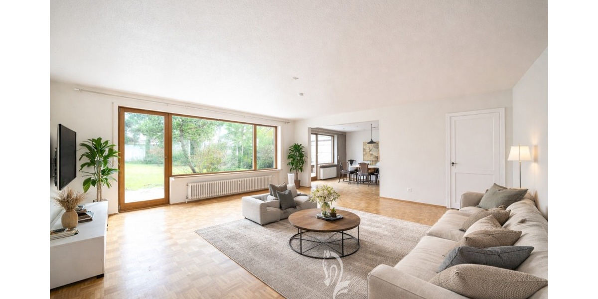 Architektenhaus mit großzügiger Einliegerwohnung und großem Garten in attraktiver Wohnlage - Einfamilienhaus Unterpleichfeld | Angebot:26073612