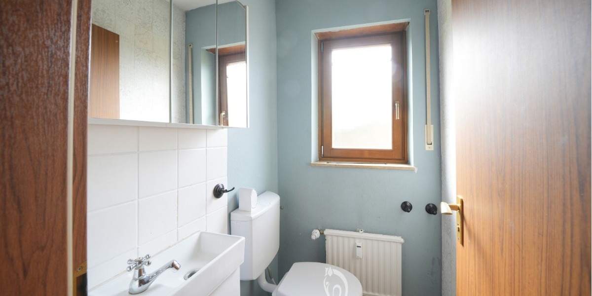 Architektenhaus mit großzügiger Einliegerwohnung und großem Garten in attraktiver Wohnlage - Einfamilienhaus Unterpleichfeld | Angebot:26073612