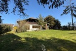 Architektenhaus mit großzügiger Einliegerwohnung und großem Garten in attraktiver Wohnlage - Einfamilienhaus Unterpleichfeld | Angebot:26321812