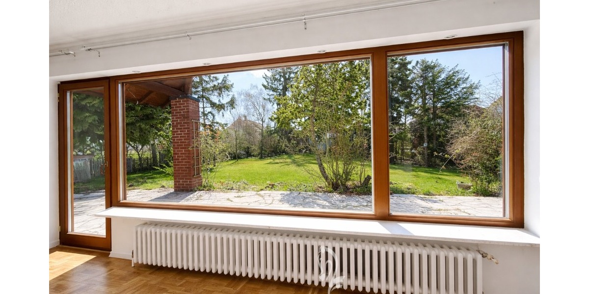 Architektenhaus mit großzügiger Einliegerwohnung und großem Garten in attraktiver Wohnlage - Einfamilienhaus Unterpleichfeld | Angebot:26321812